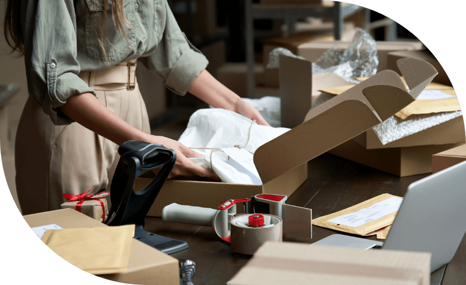 Woman packaging boxes