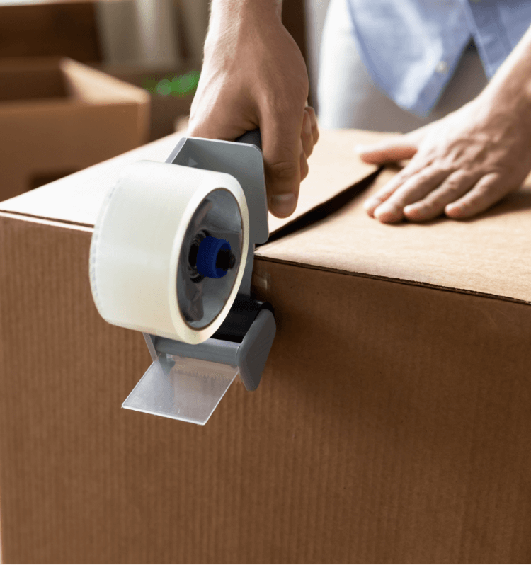 Man packaging a box